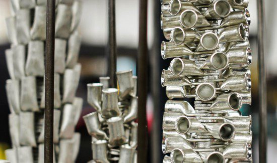 MG_6158-1-550x325 a display of various metal pipes and tubes, arranged in a visually appealing manner
