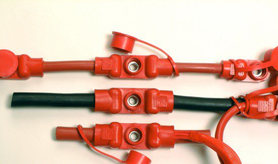 DSCF0780-e1465325680661-550x325 a red hose, possibly a fire hose, lying on a white surface