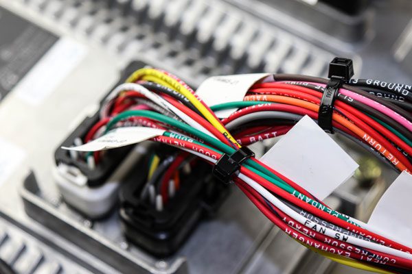 Wiring Harnesses Bundle of new high pressure hydraulic hoses in a package